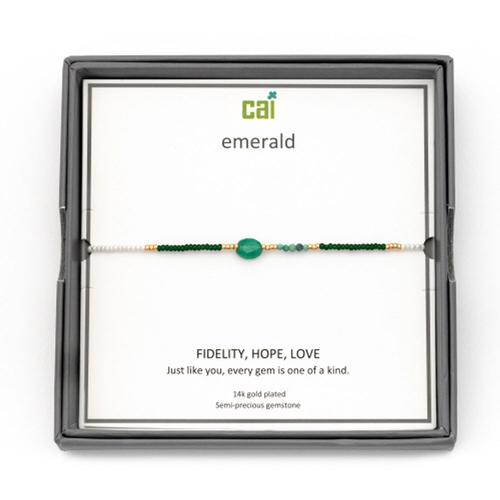 <blockquote><p>Fidelity, Hope, Love <br />Just like you, every gem is a one of a kind. </p></blockquote> <p>Bracelet features a semi-precious center stone on an elastic core strung with 14 karat gold-